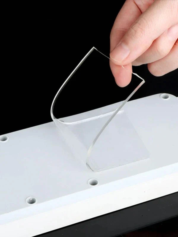 Double-sided reusable tape by Ignisio, showing the roll with flexible adhesive surfaces for versatile sticking and reusing.