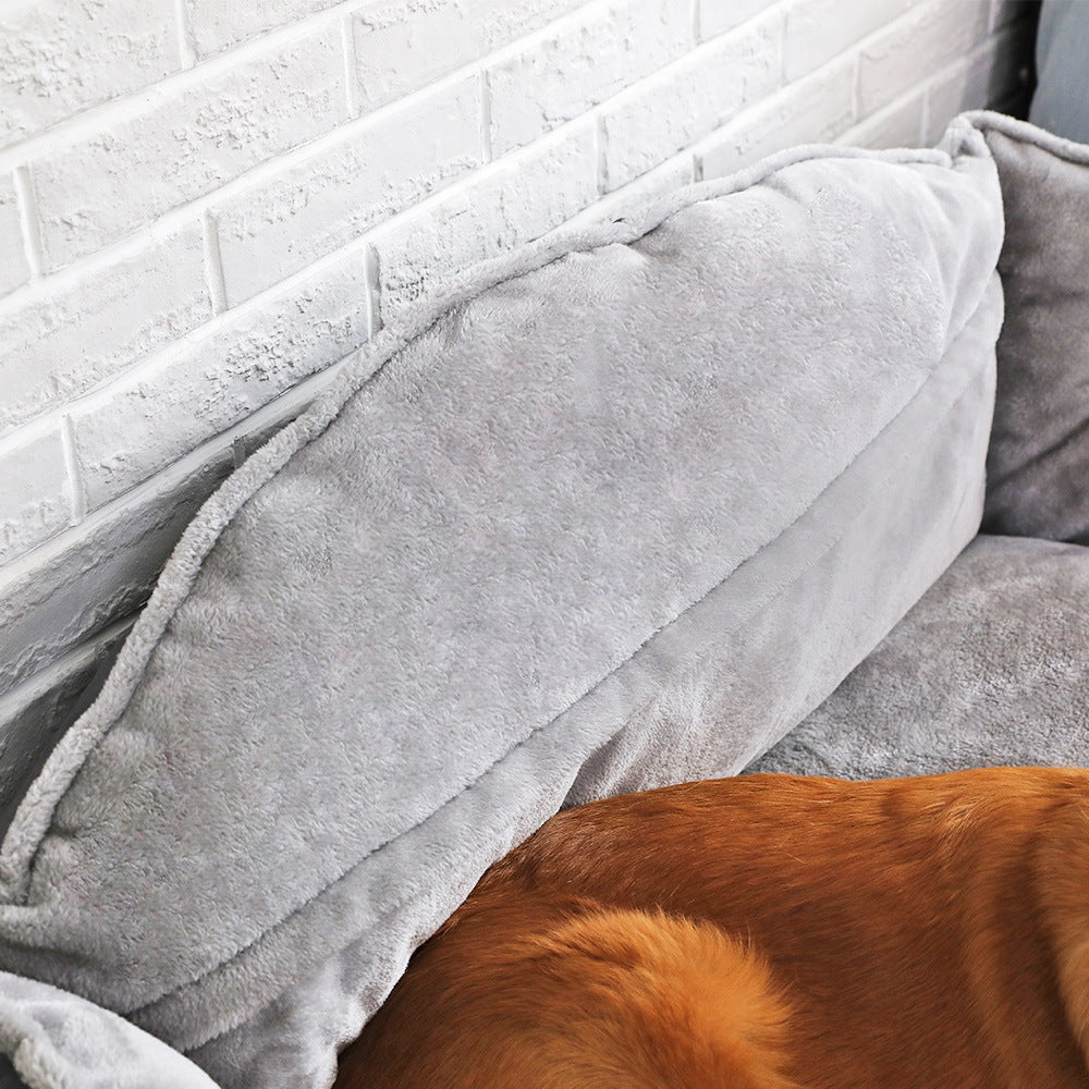 Beckett dog bed with plush fabric and cushioned sides, providing a cozy resting spot for medium-sized dogs.