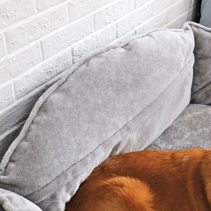 Beckett dog bed with plush fabric and cushioned sides, providing a cozy resting spot for medium-sized dogs.