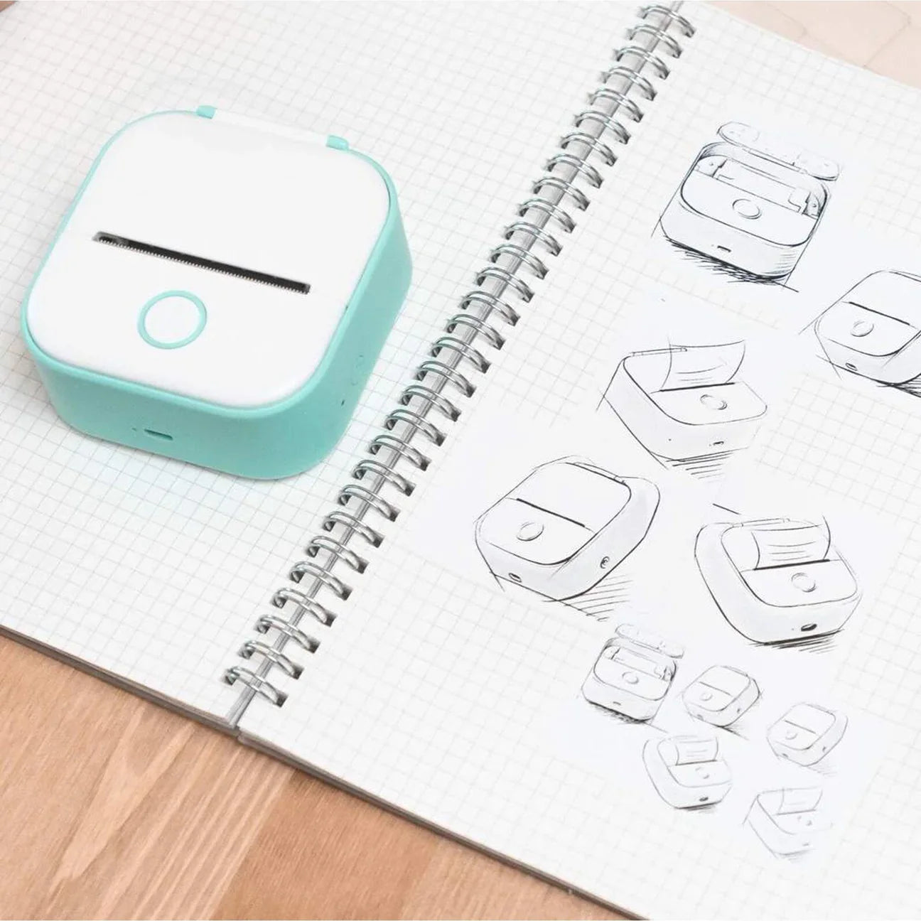 Beckett portable printer with compact design, showing the device on a table with printed documents and connectivity options.