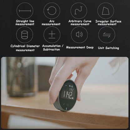 Beckett digital measurement tape showing a close-up of the LCD display and flexible measuring tape in a hand.