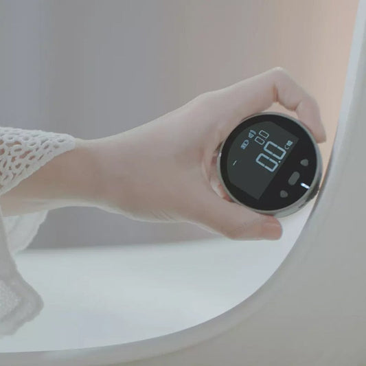 Beckett digital measurement tape showing a close-up of the digital display and tape extending for precise length measurement.