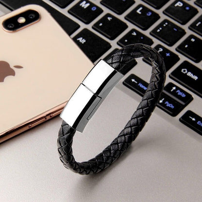 Beckett charging bracelet with sleek black design and integrated charging port, stylish and practical wearable tech accessory.