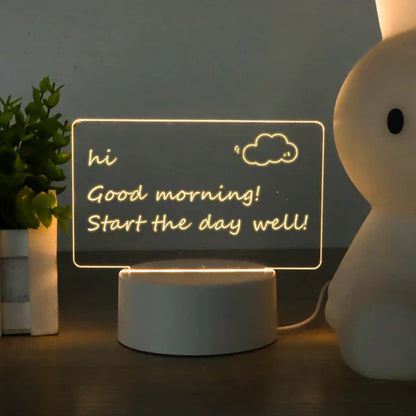 Beckett LED note board with illuminated writing surface and digital display for note-taking and messages.
