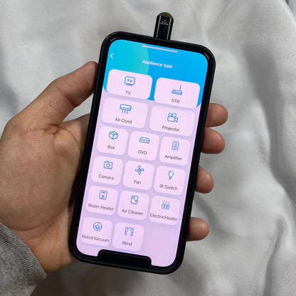 Beckett infrared phone adapter connected to a smartphone, showcasing compact design for wireless data transfer and device compatibility.