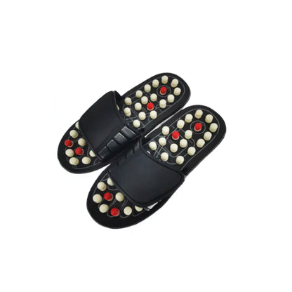 Beckett acupressure slippers with textured soles for foot massage and relief, designed for comfortable home use.