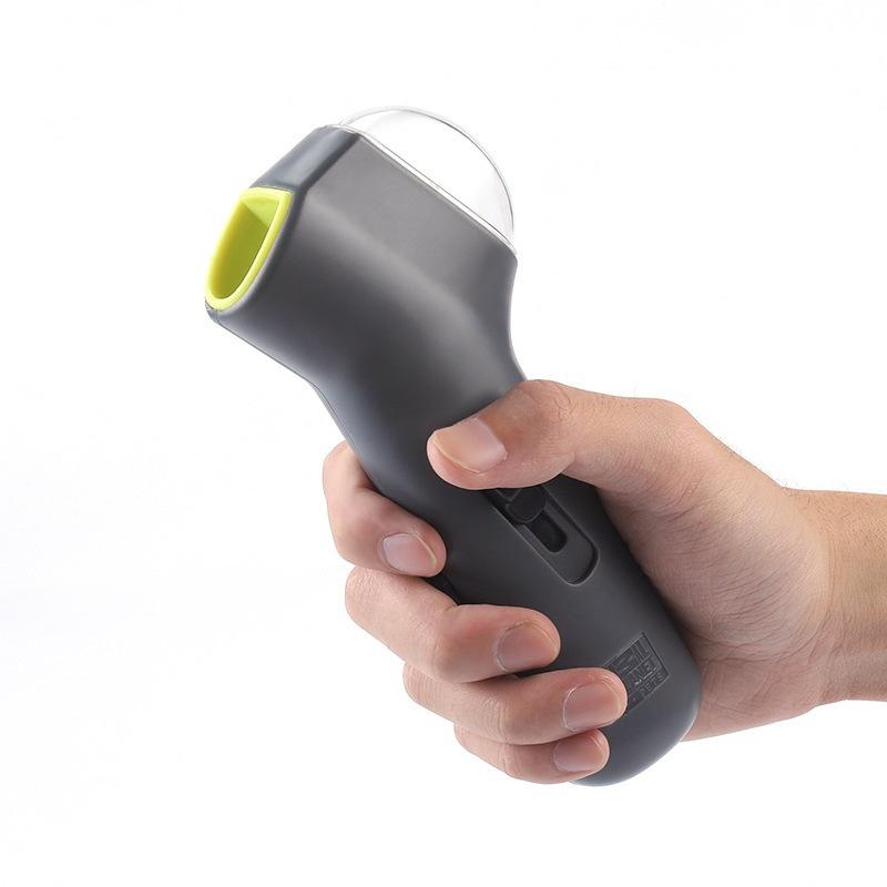 Beckett pet treat launcher with a handheld design, showcasing a colorful plastic body and a treat at the ready for playtime.
