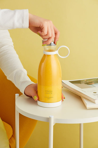 Beckett Blender Bottle with black lid and clear body, featuring mixing ball, on a white background.