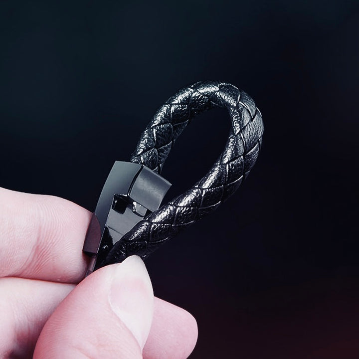 Beckett charging bracelet with sleek design and integrated charging port, displayed on a white background.