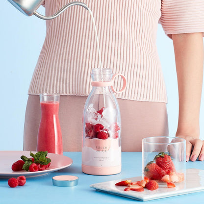 Beckett Blender Bottle with a clear plastic body and black screw-on lid, suitable for mixing shakes and beverages.