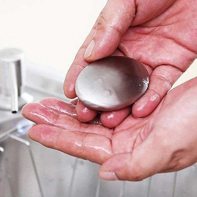 Beckett odour removing steel soap with a sleek stainless steel design for effective odor elimination from hands.